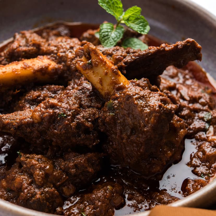 Goat Curry is a rich, slow-cooked dish with tender meat and warm spices.