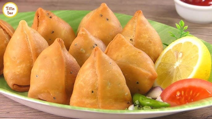 Singara is a crispy, savory Bangladeshi snack filled with spicy potatoes.